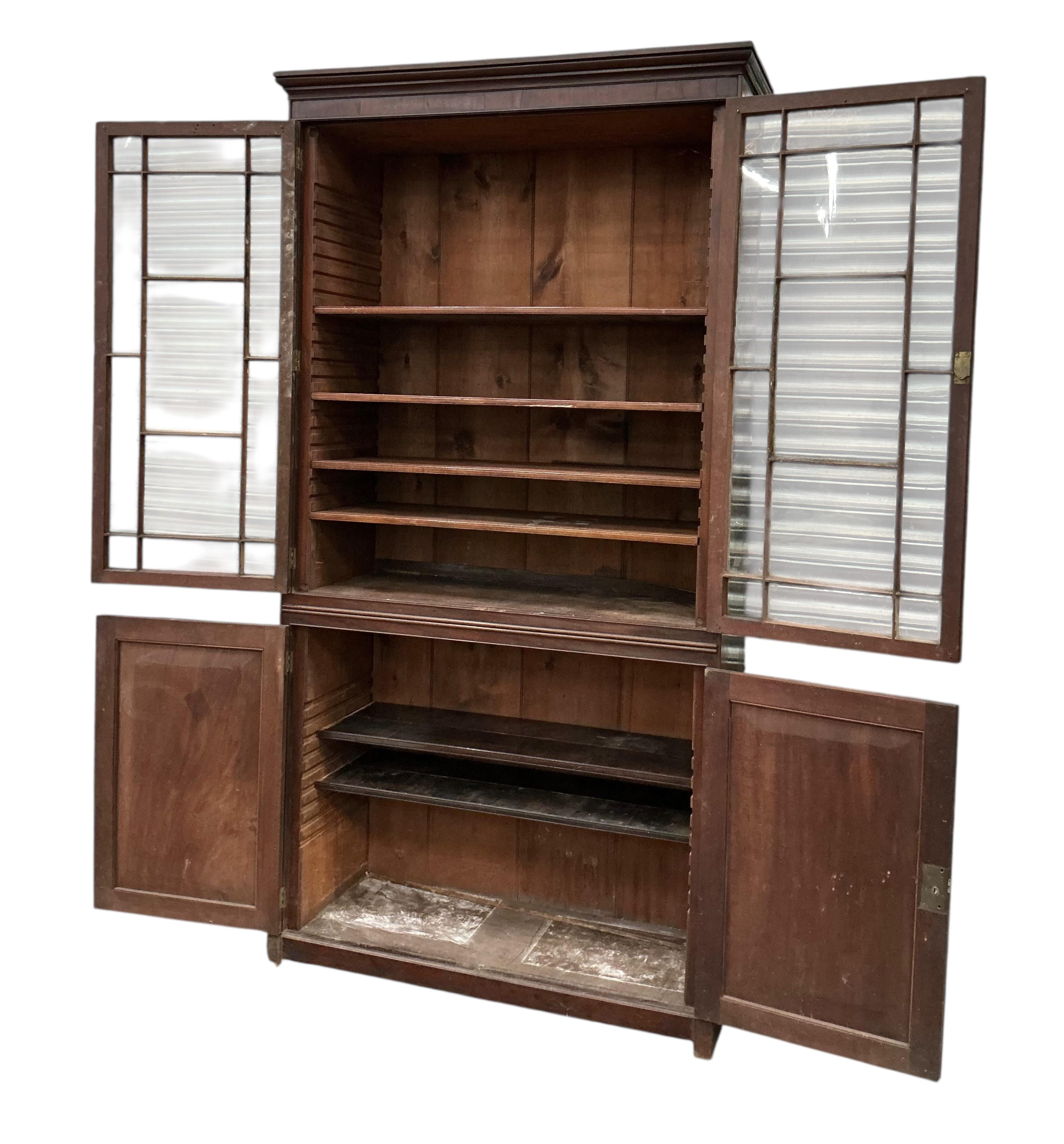A George III mahogany bookcase, width 112cm, depth 42cm, height 225cm